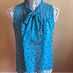 Teal and black polka dot hi-lo sleeveless blouse